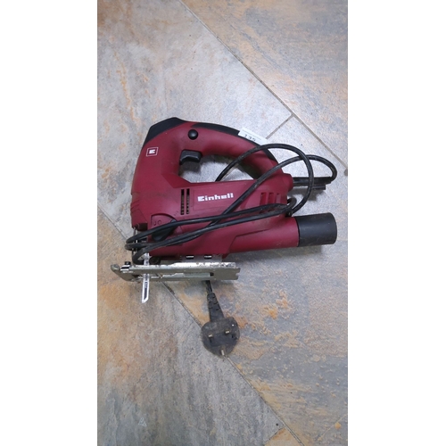 135 - Einhell electric jigsaw with a maroon and black handle. Features a standard three-pin plug connectio... 