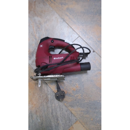 135 - Einhell electric jigsaw with a maroon and black handle. Features a standard three-pin plug connectio... 