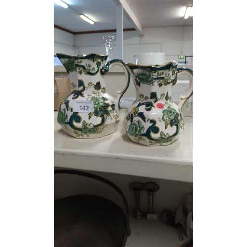 142 - Pair of Mason's Ironstone jugs with floral green and gold decoration. Marked on the base 