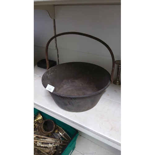 148 - Antique iron cauldron with a swinging handle, from the 19th century.