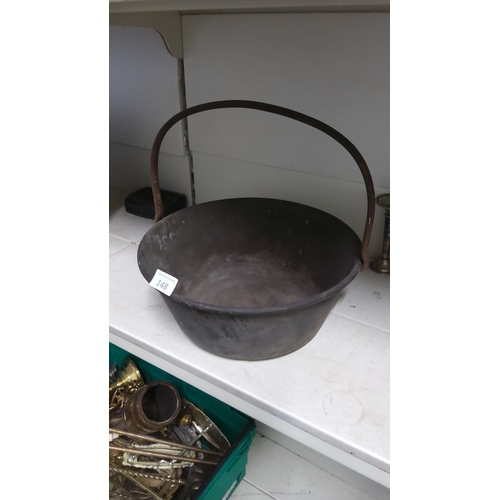 148 - Antique iron cauldron with a swinging handle, from the 19th century.