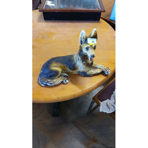 16 - Hand-painted ceramic German Shepherd figurine.