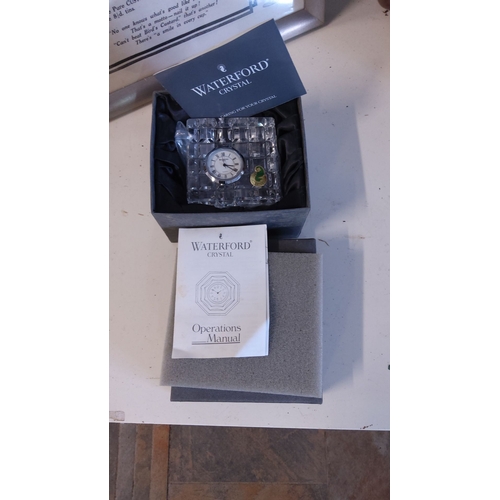 18 - Waterford Crystal clock with original box and operations manual. Features an exquisite cut crystal d... 