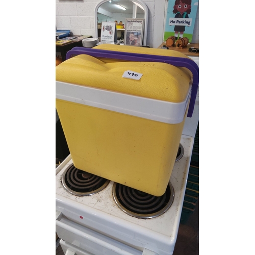 470 - Vintage yellow cooler box with a purple handle.