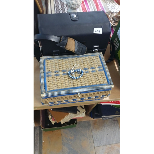 491 - Woven wicker sewing box with a blue fabric interior containing assorted vintage notions + Camera Box