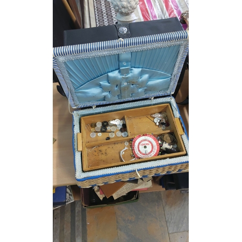 491 - Woven wicker sewing box with a blue fabric interior containing assorted vintage notions + Camera Box