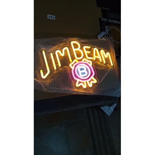 499 - Jim Beam Neon sign with vivid orange lettering and a central pink and white emblem.