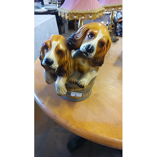 5 - Vintage ceramic figurine depicting two dogs in bucket. Finely detailed, hand-painted finish.