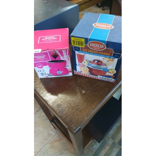 500 - American Originals Ice Cream Maker, boxed, alongside D'ancap Chocolate Fondue Set, boxed.