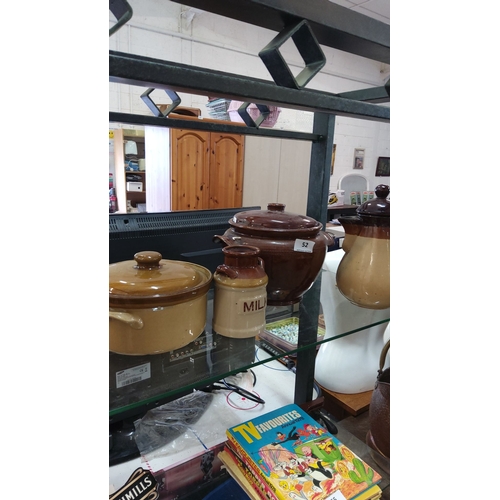 52 - Set of four vintage ceramic kitchenware items, comprising brown and beige lidded pots and a milk jug