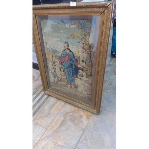 57 - Framed religious tapestry depicting Jesus with children, set in an ornate gold wood frame. The scene... 