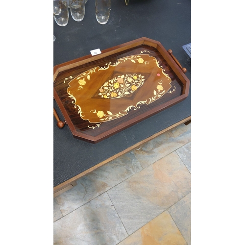 90 - Wooden serving tray with floral motif, featuring intricate marquetry design and wooden handles, from... 