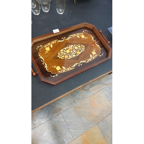 90 - Wooden serving tray with floral motif, featuring intricate marquetry design and wooden handles, from... 