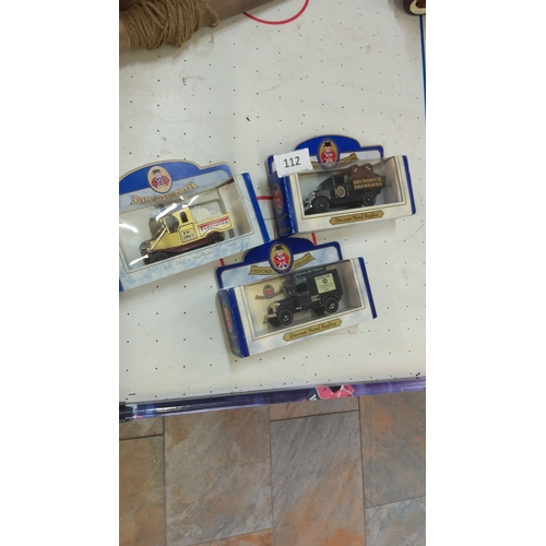 112 - Set of three Oxford Die-Cast model vehicles, including brewery and delivery replicas, in original pa... 