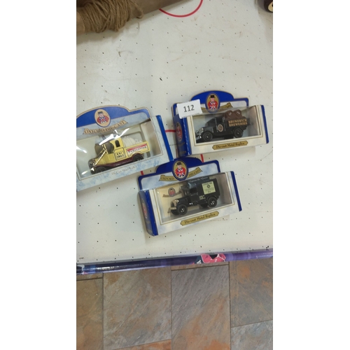 112 - Set of three Oxford Die-Cast model vehicles, including brewery and delivery replicas, in original pa... 