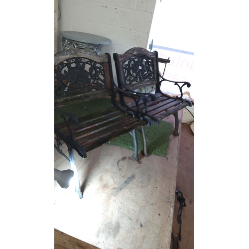 363 - Pair of vintage cast iron framed and wood garden benches with floral back design. Approximately 36 i... 