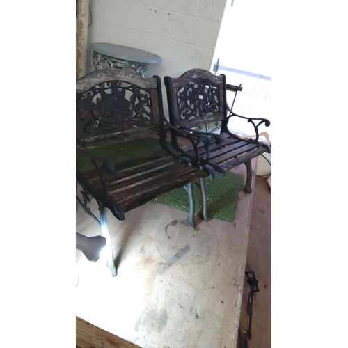 363 - Pair of vintage cast iron framed and wood garden benches with floral back design. Approximately 36 i... 