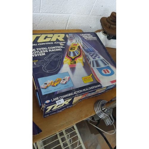 375 - TCR Slotless Racing Set, featuring lighted Jam Car Speedway. Includes approximately 23 feet of track... 