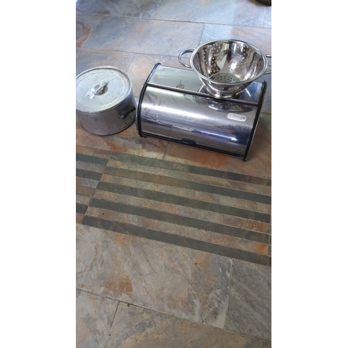 395 - Lot of Kitchen items incl collander,bread bin and large pot