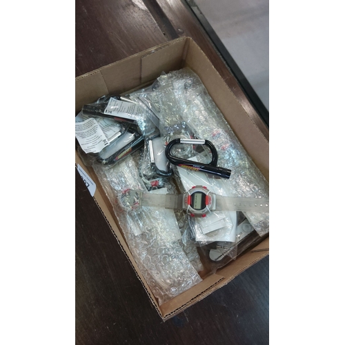 397 - Box of assorted gadgets, including digital watches and carabiner keychains, in original packaging. M... 