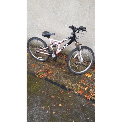 406 - Comanche Jeep mountain bike features a dual-suspension frame and multiple gears, equipped with rugge... 