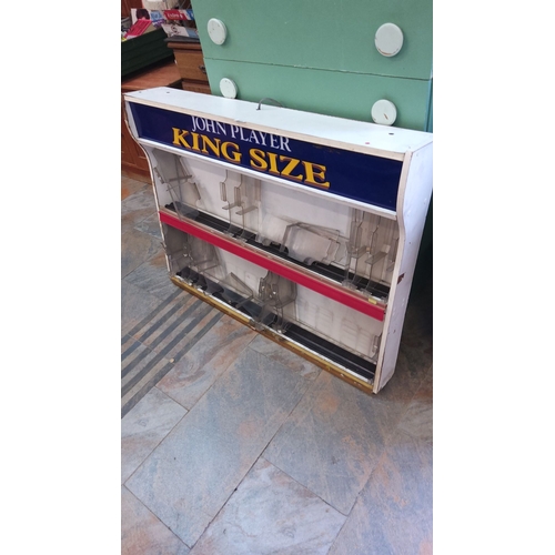 411 - Plastic and metal construction cigarette display rack. Approximately 85 cm high, 90 cm wide, 20 cm d... 