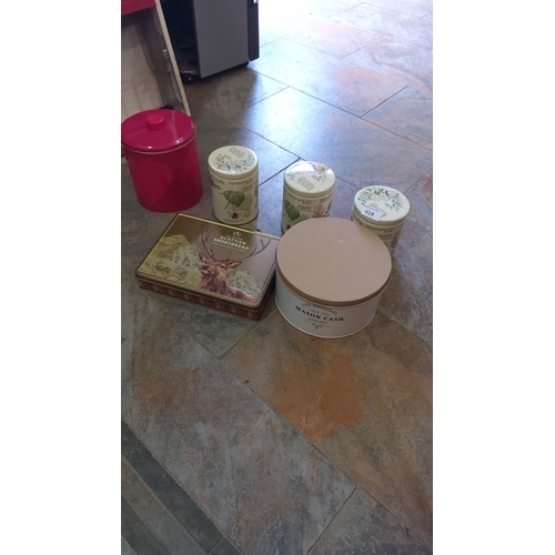 419 - Mixed lot of decorative tin containers, including Scottish Shortbread and Mason Cash designs. Variou... 