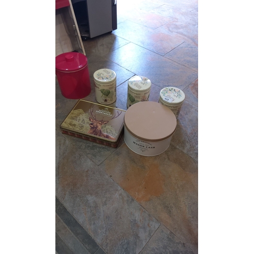 419 - Mixed lot of decorative tin containers, including Scottish Shortbread and Mason Cash designs. Variou... 