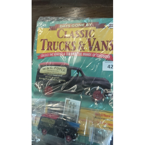 421 - Collectible die-cast vehicle featuring W. & G. Foyle Booksellers van in original packaging.