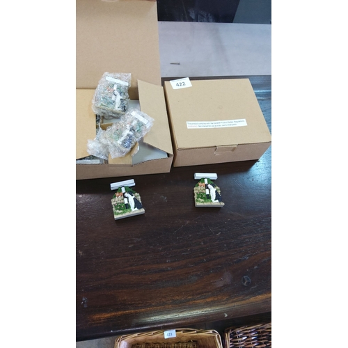 422 - 2 boxes of fridge magnets (24)