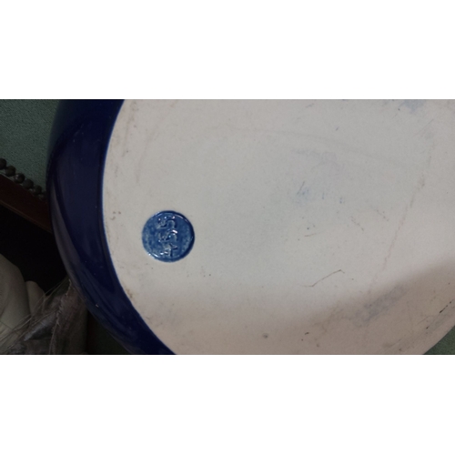 426 - Blue and white porcelain mixing bowl with a wax seal on the base. Approximately 30 cm in diameter.