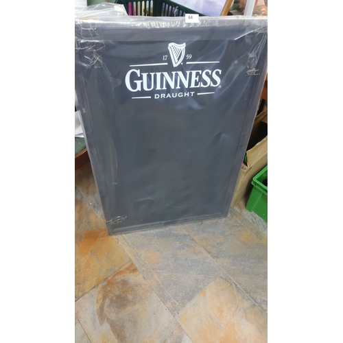 64 - New Guinness menu board,featuring iconic logo. Approximately 24 x 36 inches