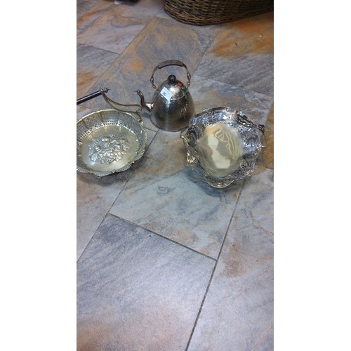 90 - Silver-plated set including a decorative tray, pierced basket with handle, and ornate teapot with di... 