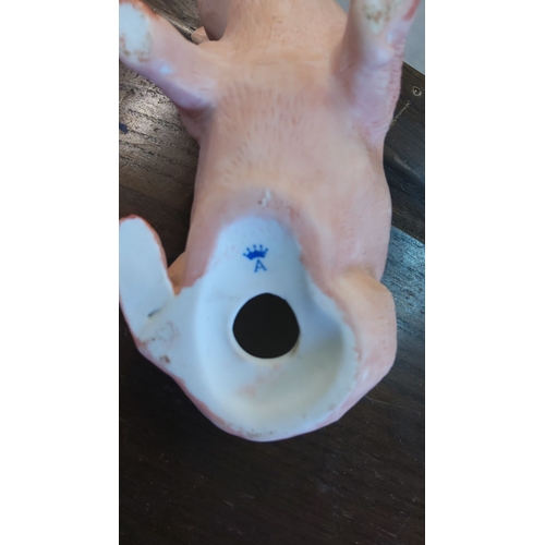 97 - Porcelain pig figurine, featuring a blue crown and letter 