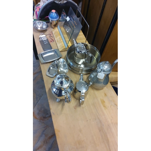 266 - Set of stainless steel & silver plated kitchen items including teapots, trays, and a container, feat... 