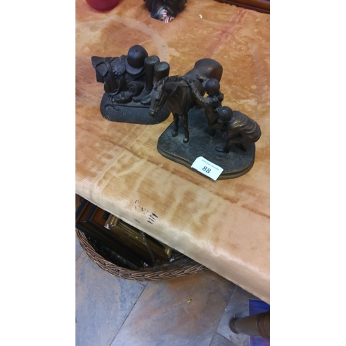 88 - Genesis bronze type sculptures x 2