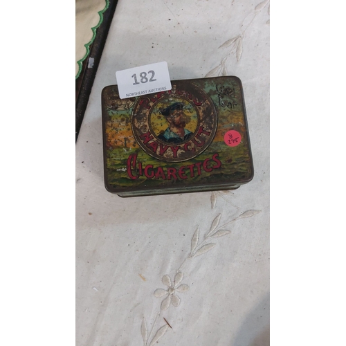 182 - Vintage Player's Navy Cut Cigarettes tin features an iconic sailor design with colorful graphics.