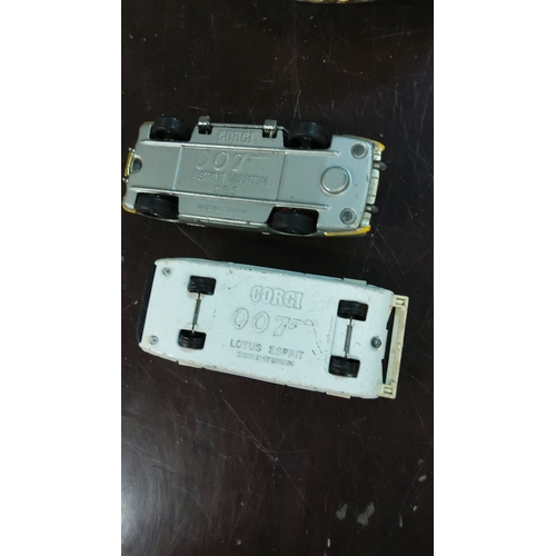 183 - Corgi diecast models include 007 Aston Martin DB5 and Lotus Esprit, made in Great Britain.