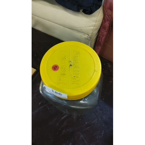 186 - Pascal Murray clear glass sweetie jar with a yellow lid.