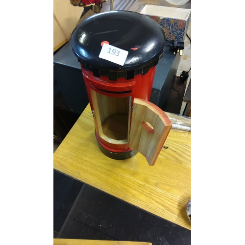 193 - Miniature wooden postbox model, painted red and black, features a hinged door with a small compartme... 