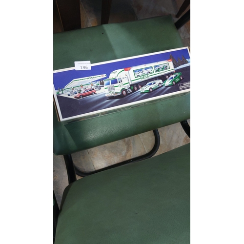 196 - Hess Toy Truck, complete with original box. Features vibrant artwork displaying classic delivery tru... 
