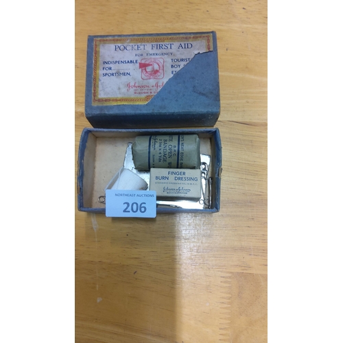 206 - Vintage Johnson & Johnson Pocket First Aid kit. Includes burn dressing, bandage, safety pins. Comple... 