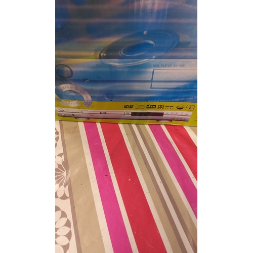 209 - Boxed DVD Player DV-100P features Dolby Digital, DTS support, and Super Slim design. It is in new co... 