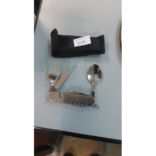 219 - Stainless steel camping utensil tool includes a fork, knife, spoon, corkscrew, and pouch.