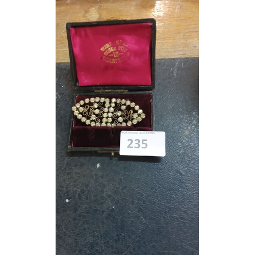 235 - Victorian-style rhinestone brooch, embellished with intricate filigree design, gold-plated finish, p... 