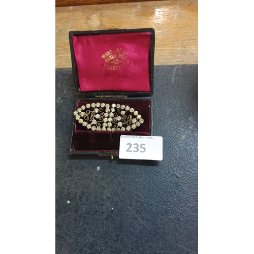 235 - Victorian-style rhinestone brooch, embellished with intricate filigree design, gold-plated finish, p... 