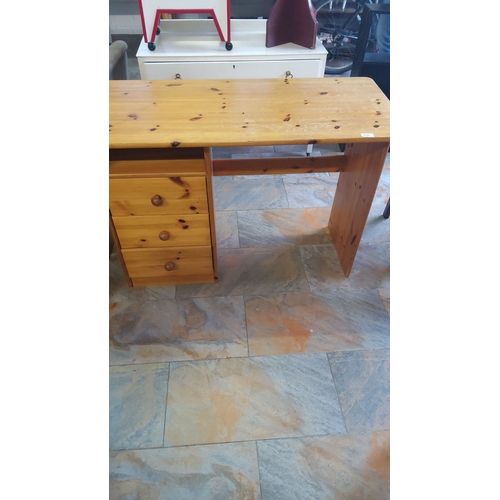 299 - Solid pine desk with three drawers, natural finish.