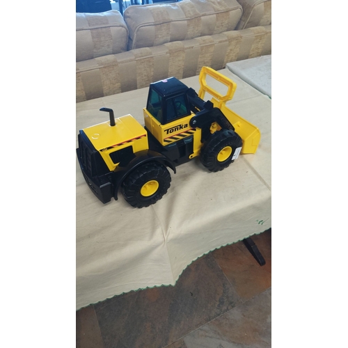 3 - Yellow and black toy bulldozer with large tires and a functional shovel, made of durable plastic.