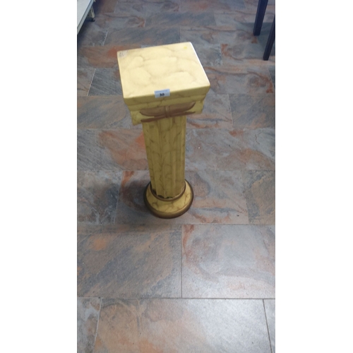 30 - Decorative pedestal with a faux marble style finish, featuring a square top and rounded base.