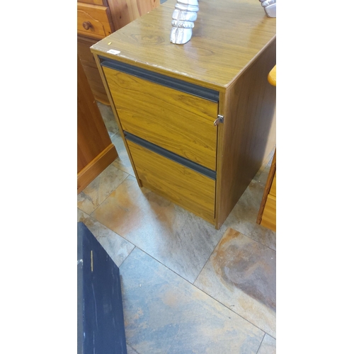 300 - Wooden filing cabinet with two drawers and metal handles, featuring a wood grain finish.